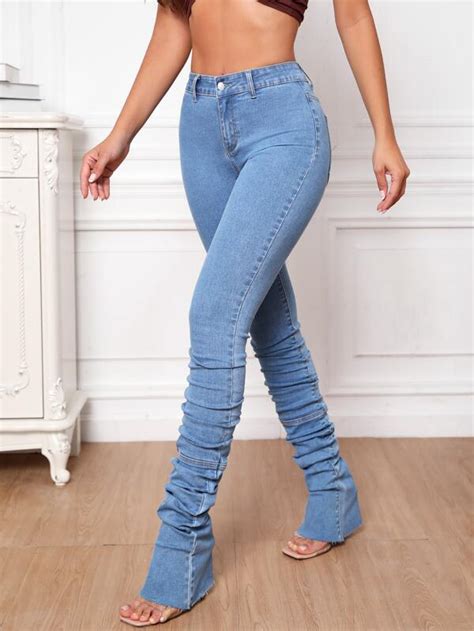 stacked distressed jeans|high waist stacked jeans.